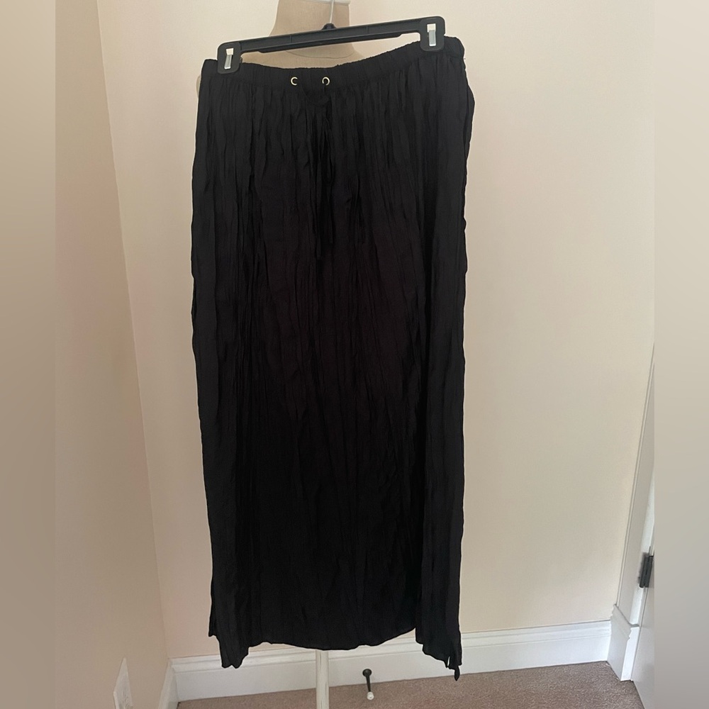 Black J Crew crinkle skirt.